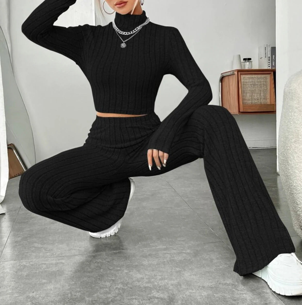 Elegant cotton turtleneck and wide-leg trousers suit in various colours, including bean green, light gray, dark red, and sapphire blue.