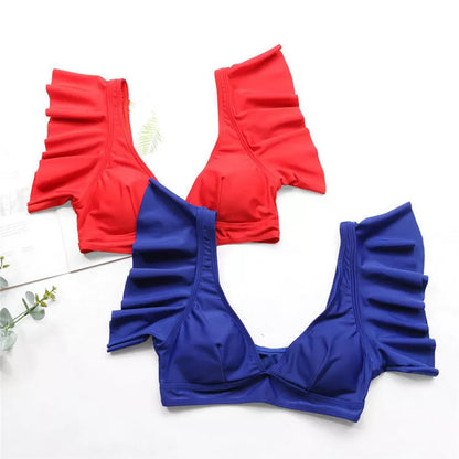 Women's two-piece swimsuit in lightweight polyester, available in red, yellow, and blue
