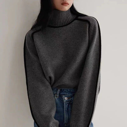 Half turtleneck knitted sweater with three-dimensional design in creamy white, floral brown, gray, and blue