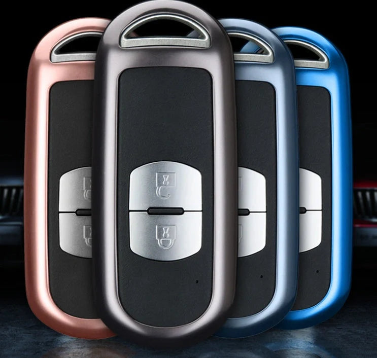 Aluminium alloy key case for Mazda with CNC engraving in sapphire, blue, grey, and rose gold