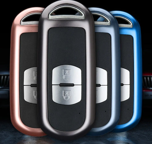 Aluminium alloy key case for Mazda with CNC engraving in sapphire, blue, grey, and rose gold