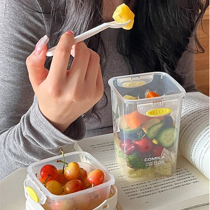 Dual-layer meal prep container with separate compartments and leak-proof lid, available in yellow and cream white colors