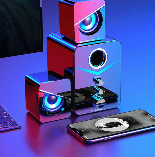 Wireless Bluetooth desktop speaker with vibrant LED lighting, providing rich, room-filling sound and customizable controls for the perfect audio experience.