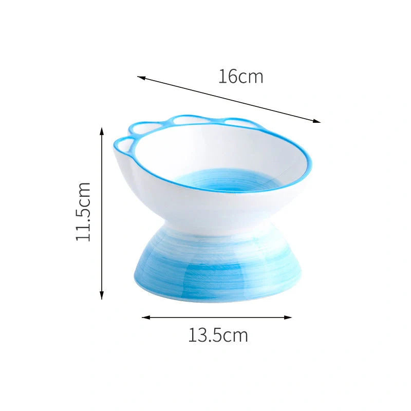 Ceramic pet bowl with 15-degree incline design in pink, green, and blue