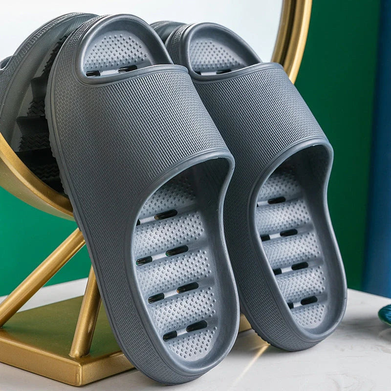 Thick-soled EVA slippers in various colours with non-slip sole and water leakage design