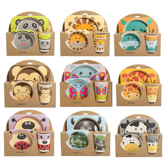 Five-piece bamboo fibre children's tableware set with plates, bowls, cups, spoons, and forks in various animal-themed designs