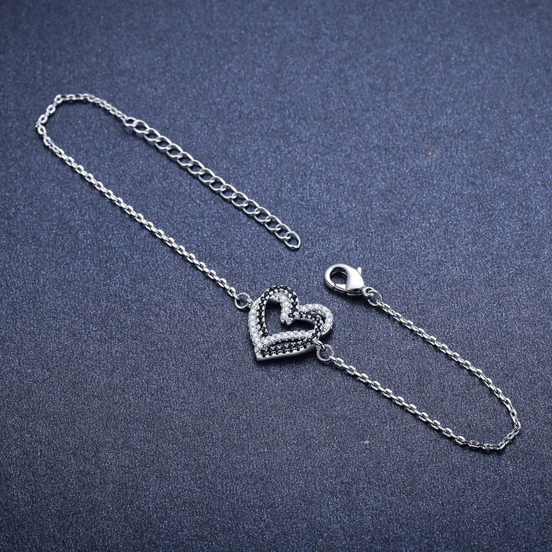 Elegant Titanium Steel Heart Bracelet for women, featuring a delicate heart design.