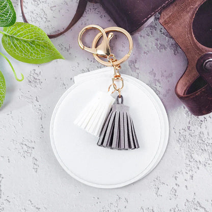 Mini round PU leather small mirror with lovely tassel in various colours