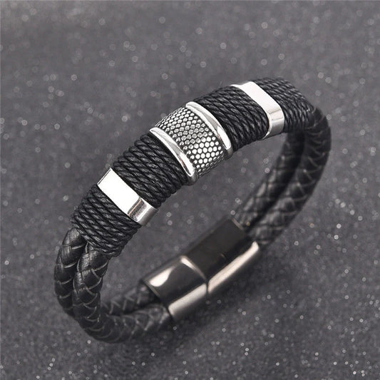 Premium black braided leather bracelet with titanium and stainless steel clasp, a timeless accessory for the modern gentleman
