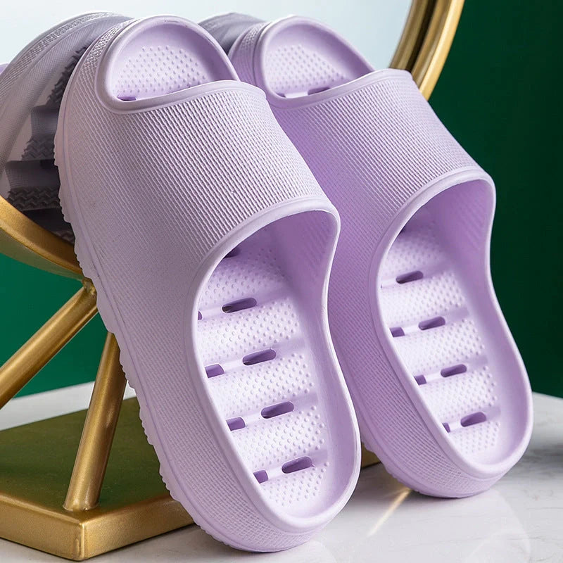 Thick-soled EVA slippers in various colours with non-slip sole and water leakage design