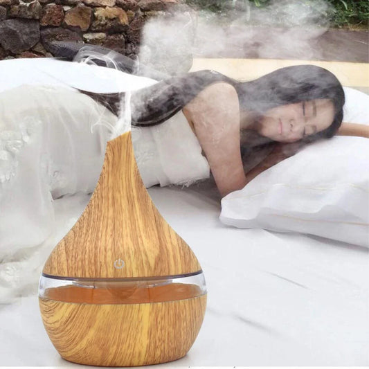 Premium essential oil diffuser with ultrasonic technology, creating a soothing, whisper-quiet mist to elevate your home's ambience