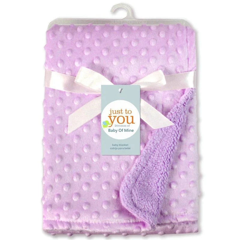 Premium plush baby blanket in various colours, perfect for swaddling, strolling, and creating a cosy nursery environment