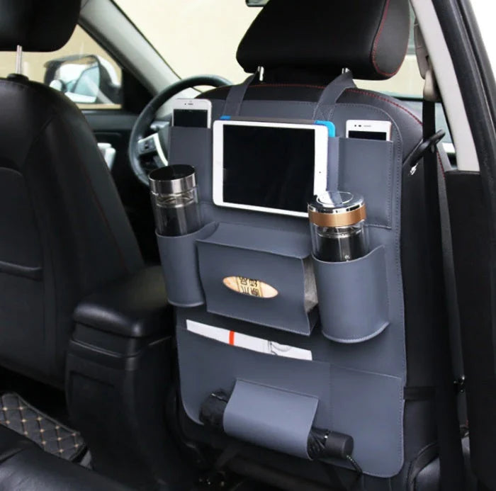Premium leather car seat organisers with ample storage space for drinks, phones, pens, and other essentials, designed for UK drivers
