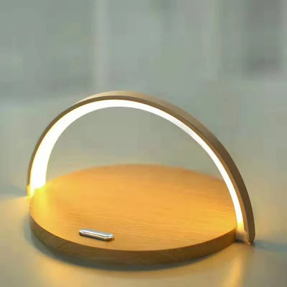 Foldable wireless charging stand with integrated LED table lamp for smartphones