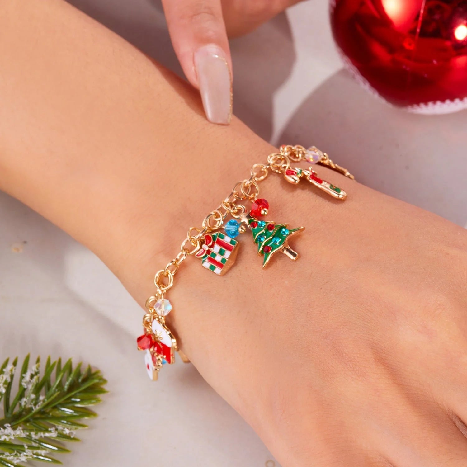 Festive Christmas bracelet with charms of a Christmas tree and Santa Claus, made of premium alloy materials