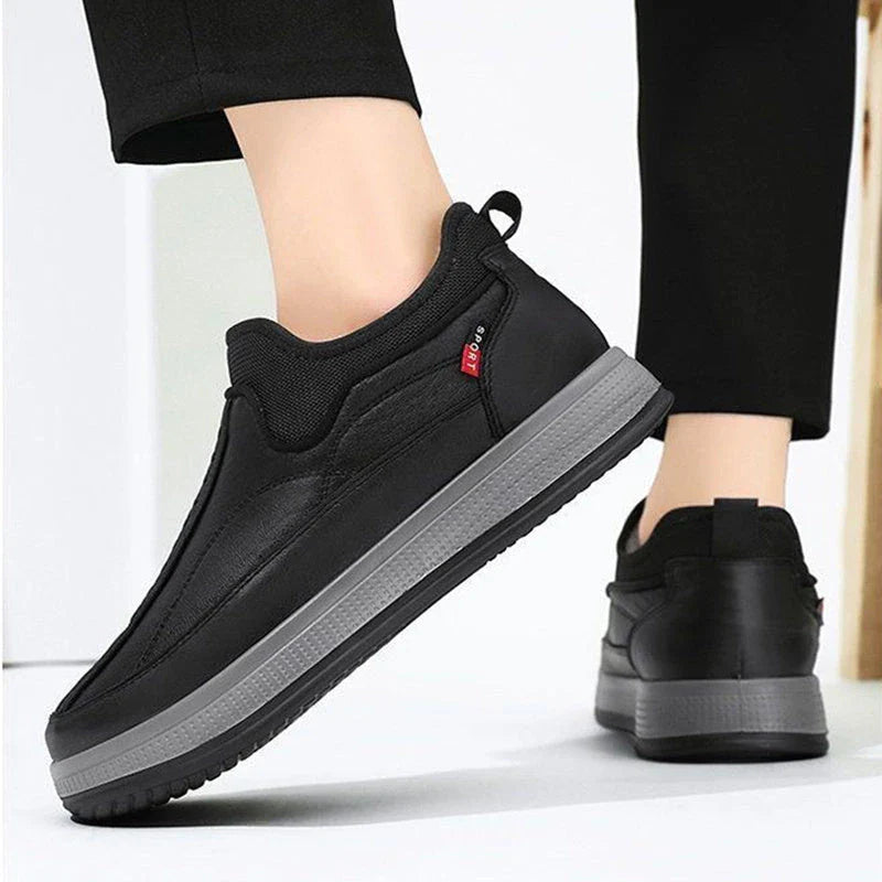 Cozy winter snow boots with round-toe design, non-slip platform, and warm fleece lining in black and grey colors