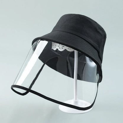 Child wearing anti-spitting protective hat with transparent bezel