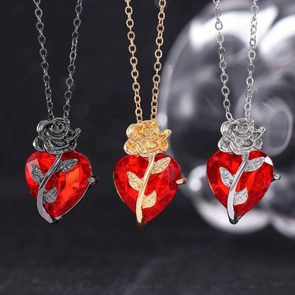 Punk Rose Love Necklace with heart-shaped clavicle chain pendant in black, gold, and silver.