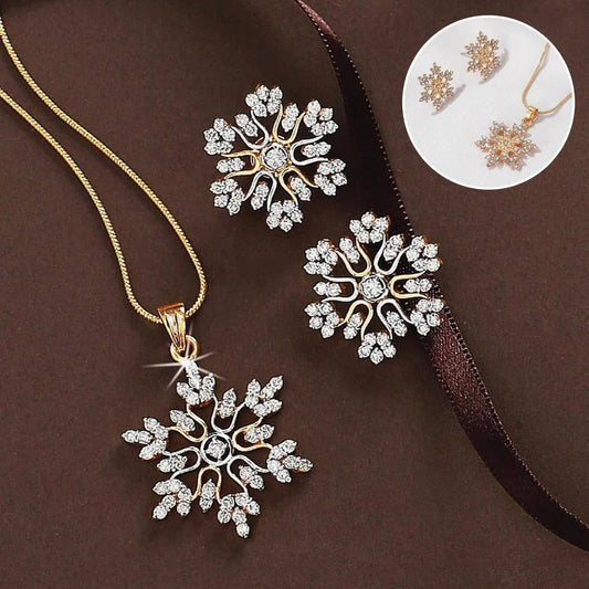 Elegant snowflake jewellery set with necklace, earrings and pendant in gold and silver tones