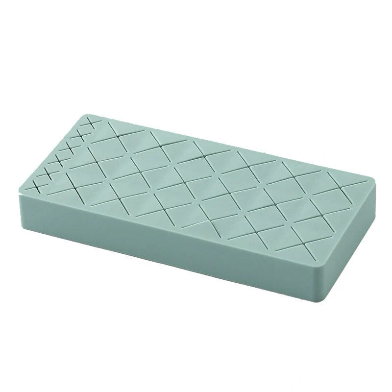 Silicone and ABS lipstick storage rack in red, pink, blue, and grey