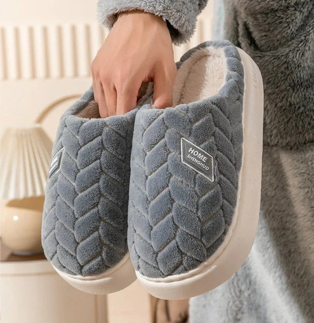 Cosy plush slippers in a variety of vibrant colours, featuring a soft fleece lining and durable non-slip sole for maximum comfort and stability.