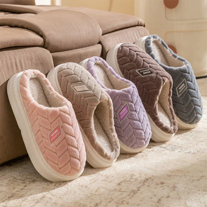 Cosy plush slippers in a variety of vibrant colours, featuring a soft fleece lining and durable non-slip sole for maximum comfort and stability.