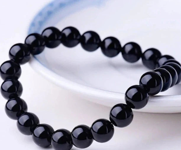 Black Onyx Bracelet with geometric design and elastic cord