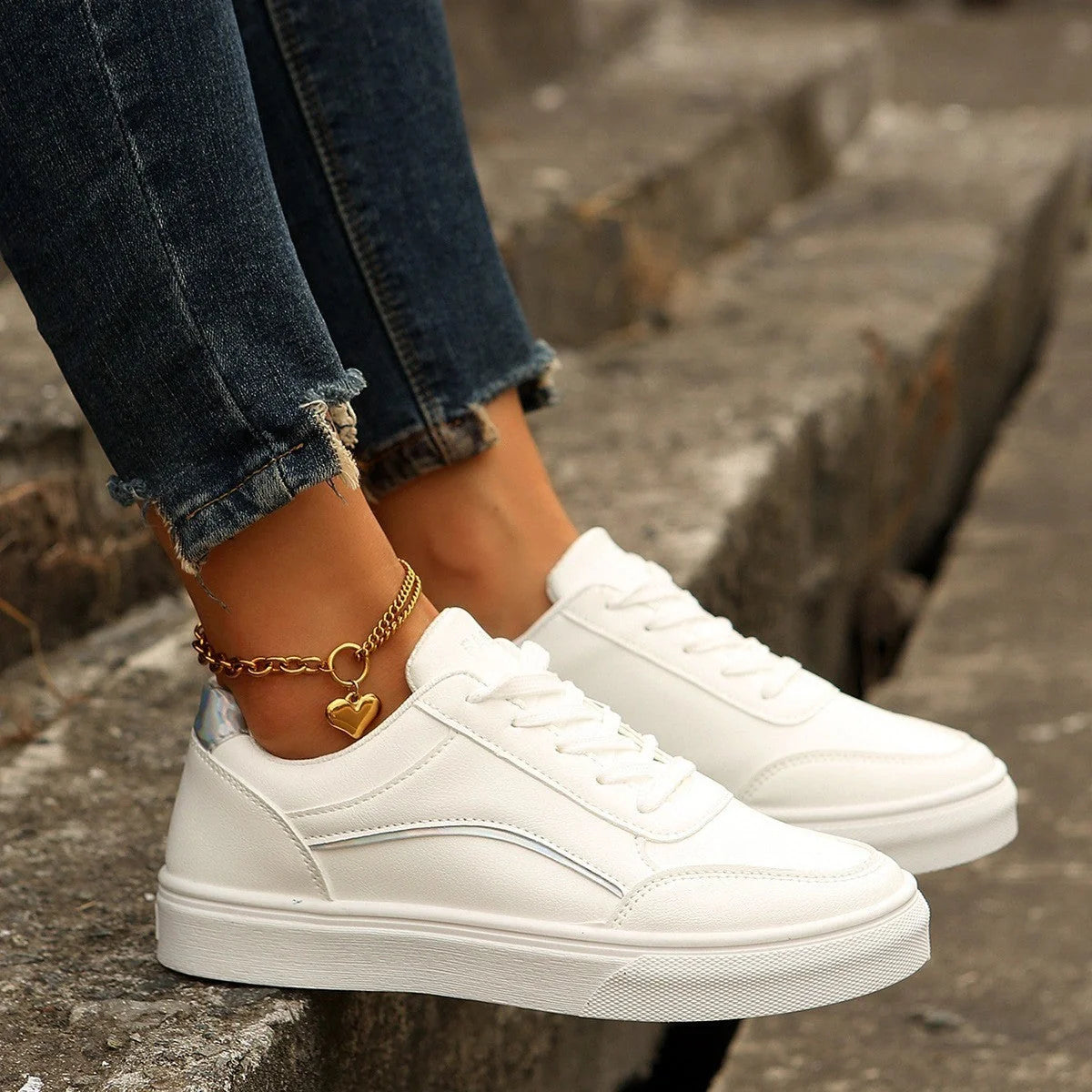 Stylish white lace-up flats for women with thick sole and round toe design