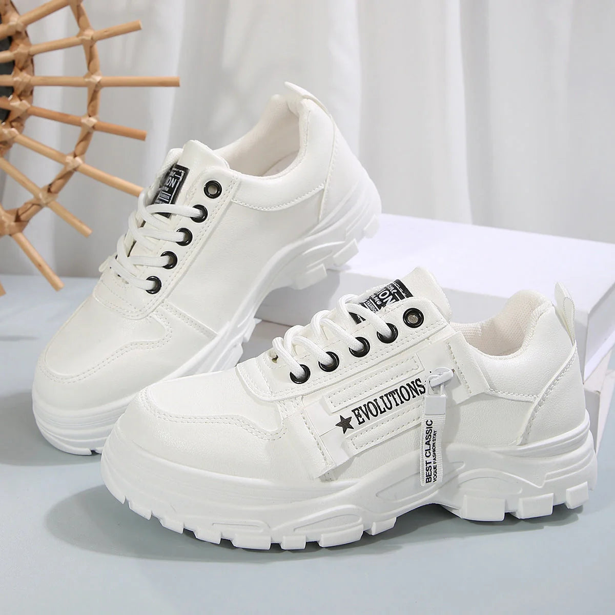 Women's lace-up sports sneakers with side-zipper in white, black, and cream white