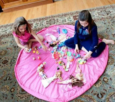 Versatile Picnic Pad made of durable nylon, featuring waterproof surface and ample storage for baby toys and essentials.