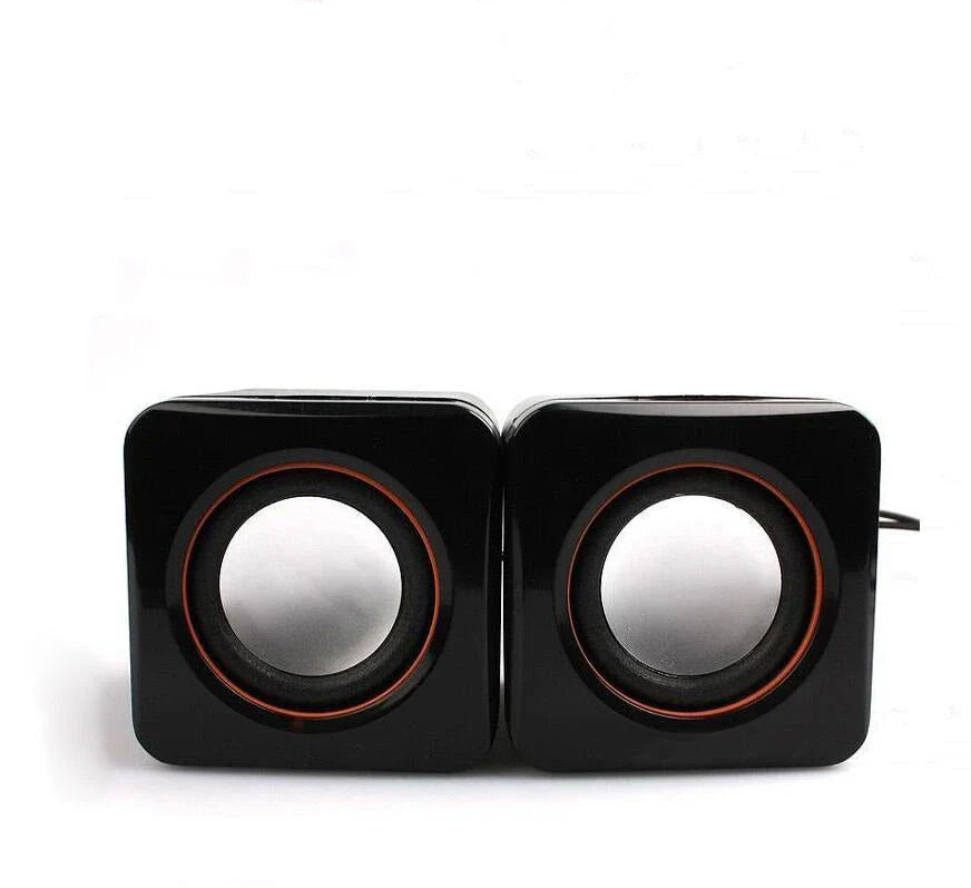 Compact USB-powered desktop speaker with sleek black design and volume control
