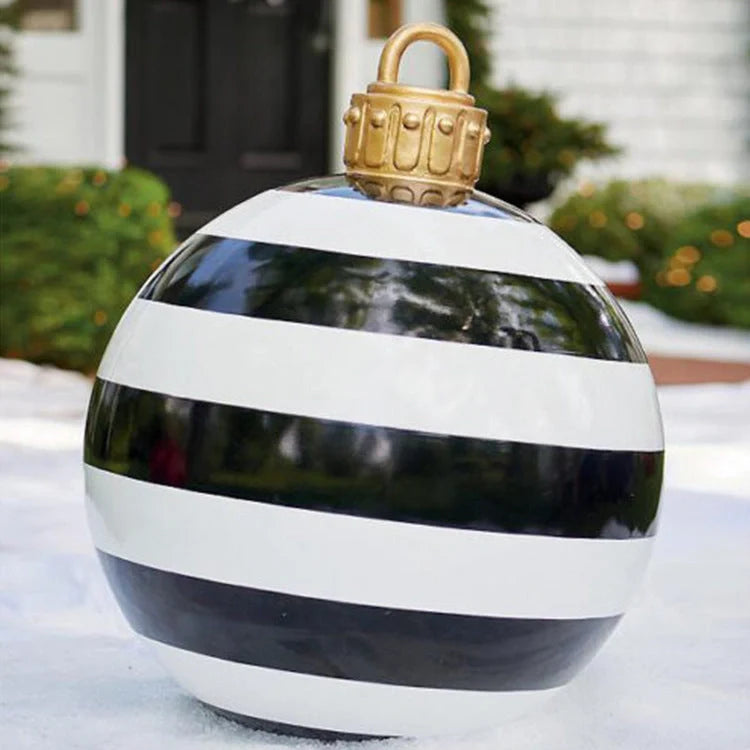 Vibrant inflatable Christmas baubles in a variety of colours and patterns, perfect for outdoor holiday decoration