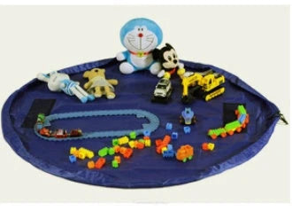 Versatile Picnic Pad made of durable nylon, featuring waterproof surface and ample storage for baby toys and essentials.