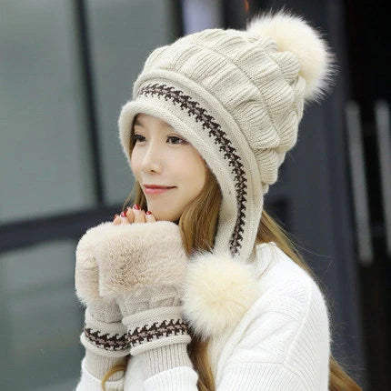Knit fleece beanie with ear flaps and pompom in various colours for winter warmth