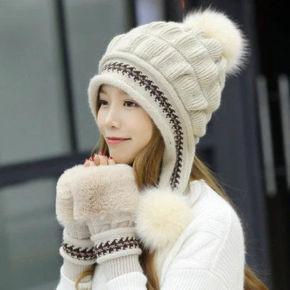 Knit fleece beanie with ear flaps and pompom in various colours for winter warmth