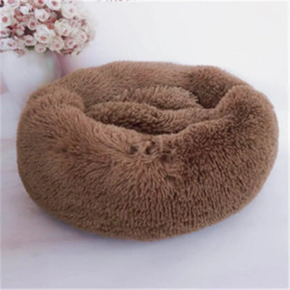 Cosy round plush cat mattress for winter warmth, available in various colours and sizes