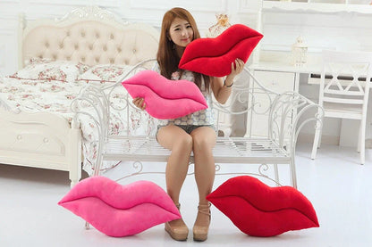 Adorable lip-shaped plush pillow for children in pink and red, perfect for cuddles and decor