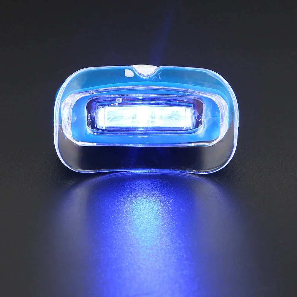 Premium blue LED teeth whitening lamp for on-the-go use, featuring compact, portable design and intelligent light technology.