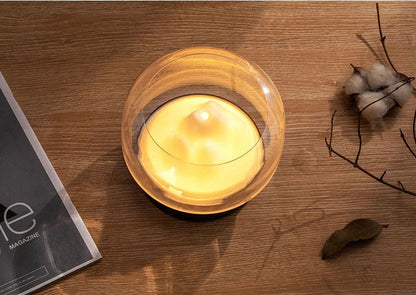 Premium aroma diffuser with serene mountain landscape design and multi-coloured night light for relaxation and well-being