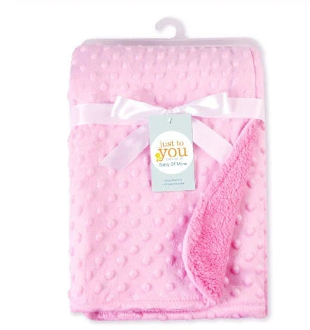 Premium plush baby blanket in various colours, perfect for swaddling, strolling, and creating a cosy nursery environment