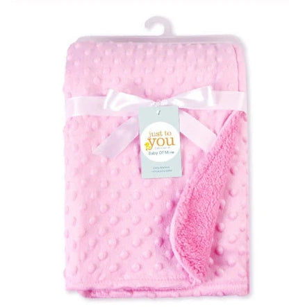 Premium plush baby blanket in various colours, perfect for swaddling, strolling, and creating a cosy nursery environment