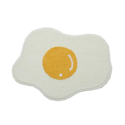 Quirky egg-shaped entrance mat made of absorbent polyester fabric with non-slip rubber backing, available in various sizes and colours