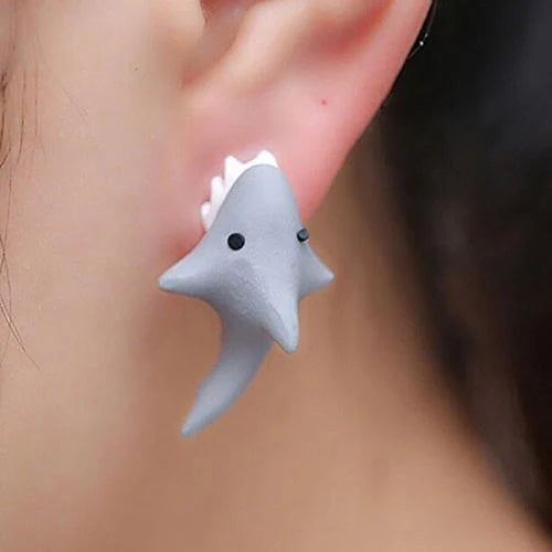 Playful animal bite earrings featuring dinosaur and whale designs, perfect for adding a quirky touch to your style.
