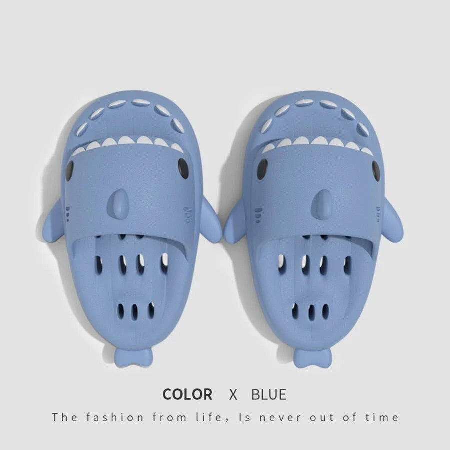 Fashionable shark-themed shower slides with drainage holes, featuring a realistic shark design, quick-drying EVA material, and non-slip traction.
