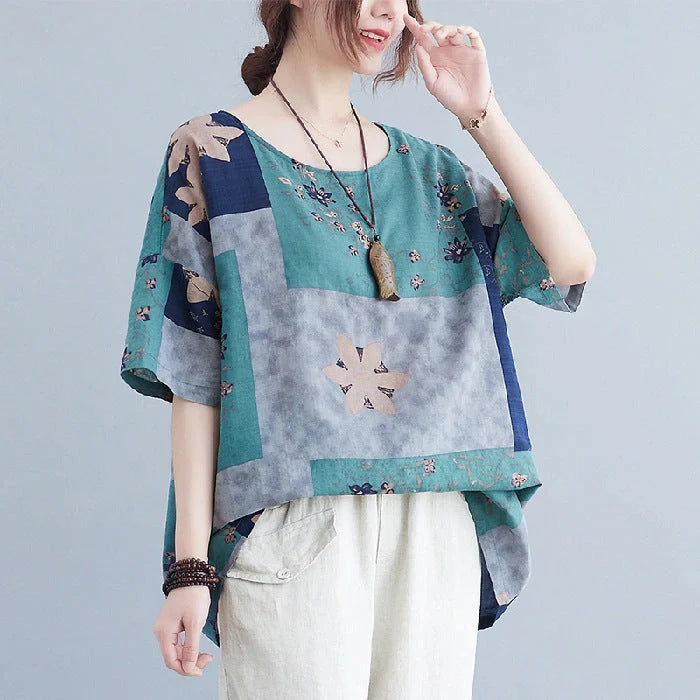 Stylish loose-fit floral print t-shirt in greyish purple, green, and navy blue colours