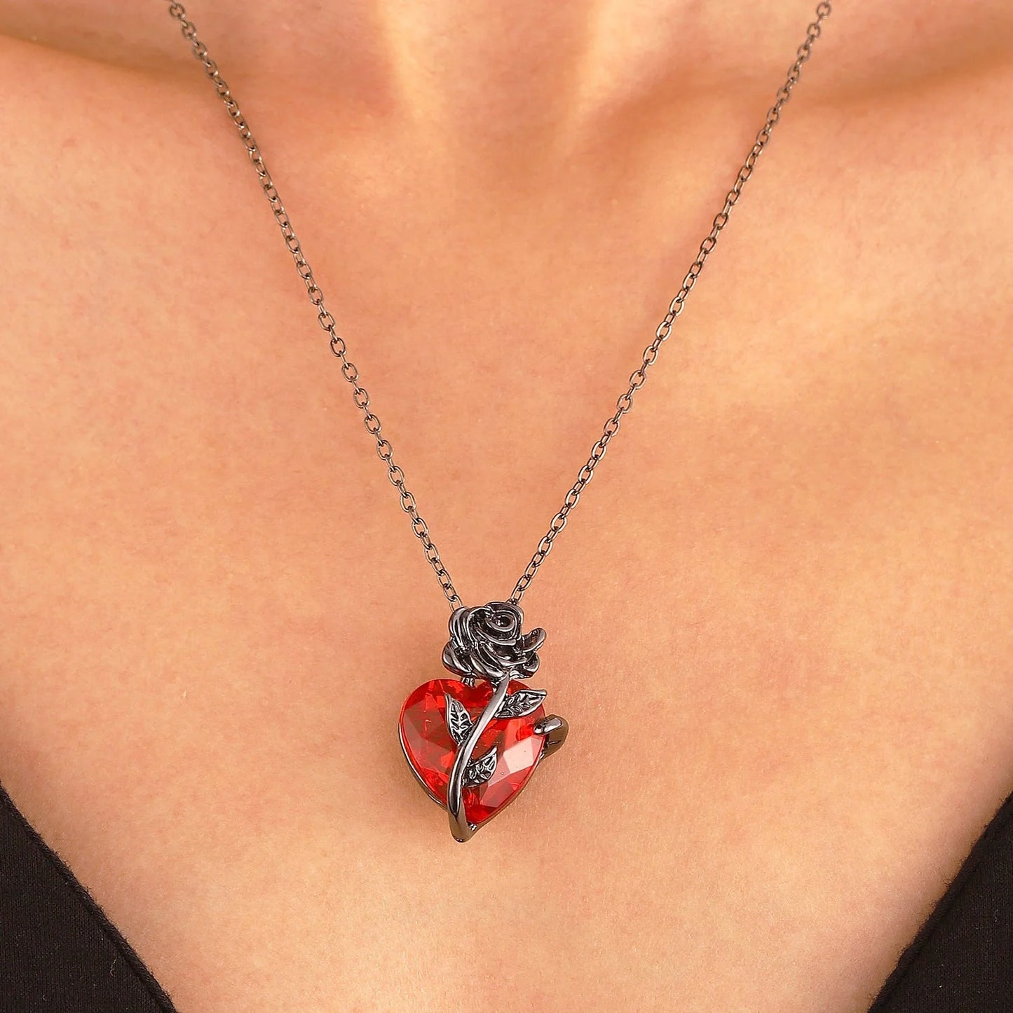 Punk Rose Love Necklace with heart-shaped clavicle chain pendant in black, gold, and silver.