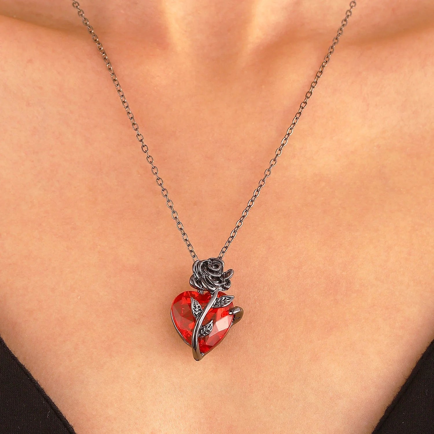 Punk Rose Love Necklace with heart-shaped clavicle chain pendant in black, gold, and silver.