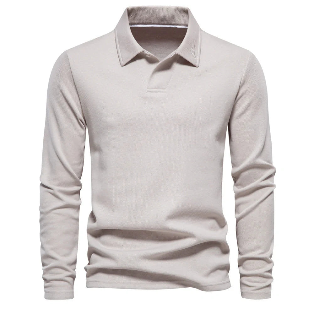 A versatile cotton polo shirt in a range of sophisticated colours, featuring a unique lapel design for a refined casual look.