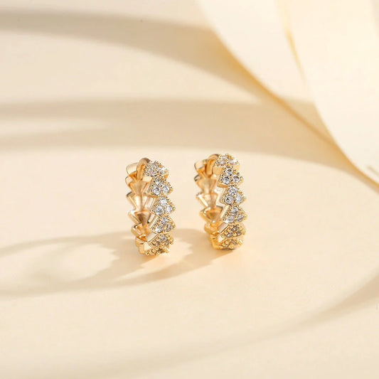 Premium copper-plated gold and zircon stud earrings in a classic design, exuding British elegance and sophistication