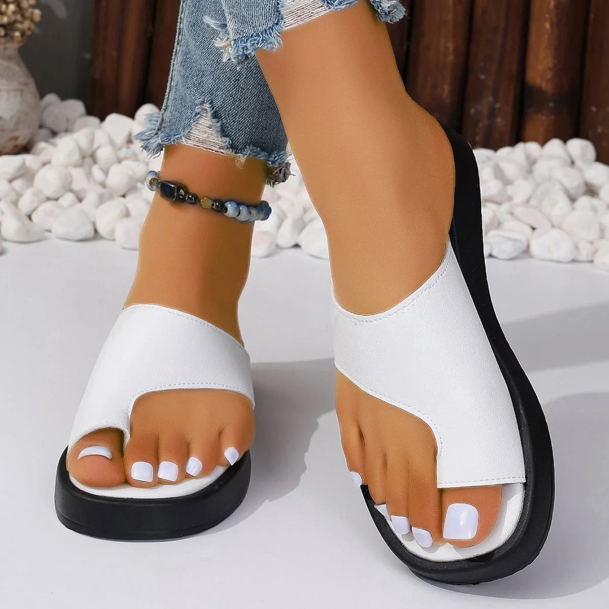 Stylish thick-soled clip-toe slippers for women in various colours, perfect for summer casual wear.